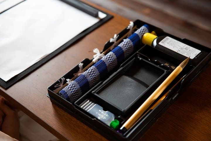 Calligraphy experience with simple kimono in Okinawa — photo 4
