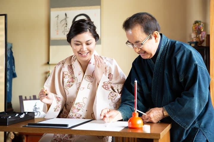 Calligraphy experience with simple kimono in Okinawa — photo 8