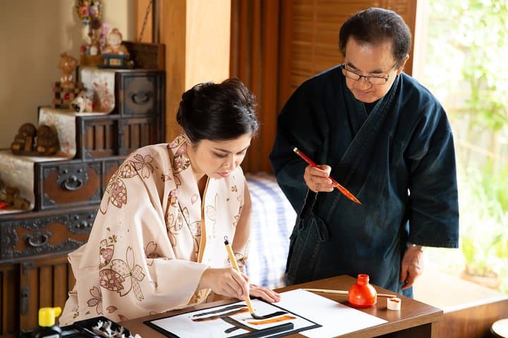 Calligraphy experience with simple kimono in Okinawa — photo 10