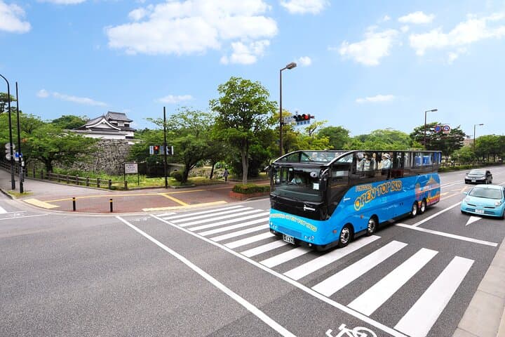 Fukuoka Open Top Bus and Hakata Doll Painting Experience with Guide — photo 3
