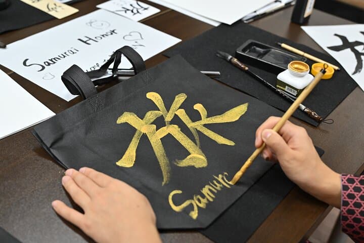 Learning Zen of Japanese Calligraphy in kimono near Osaka Castle — photo 19