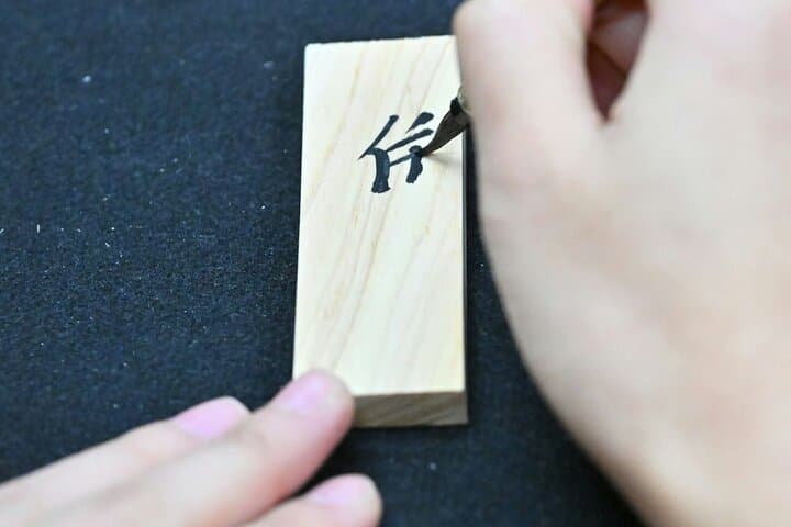 Learning Zen of Japanese Calligraphy in kimono near Osaka Castle — photo 17