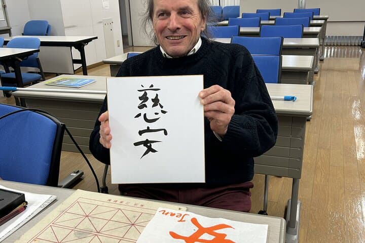 Calligraphy Experience in Tokyo Writing on Colored Paper — photo 3