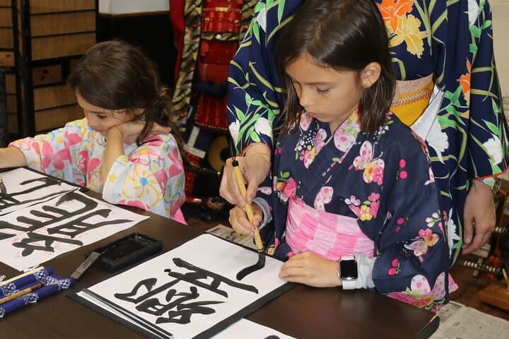 Learning Zen of Japanese Calligraphy in kimono near Osaka Castle — photo 12