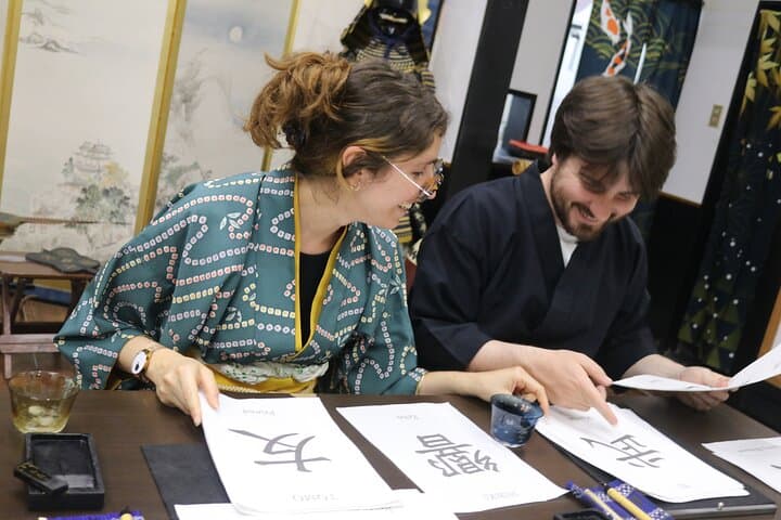 Learning Zen of Japanese Calligraphy in kimono near Osaka Castle — photo 13