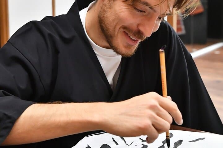 Learning Zen of Japanese Calligraphy in kimono near Osaka Castle — photo 9