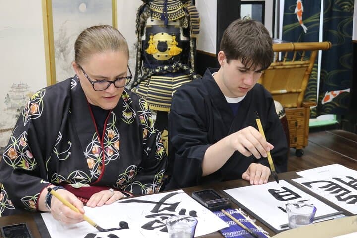 Learning Zen of Japanese Calligraphy in kimono near Osaka Castle — photo 14