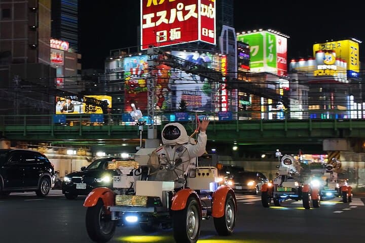 Tokyo Astronaut Tour in Space Suit Drive the Tiny Moon Car — photo 4