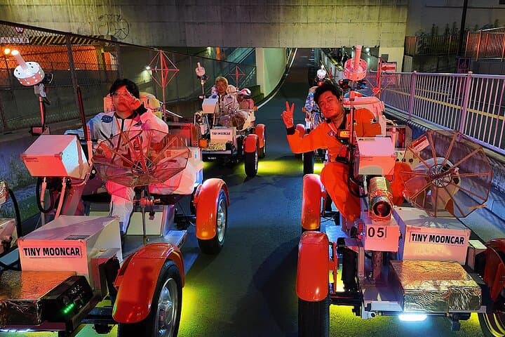 Tokyo Astronaut Tour in Space Suit Drive the Tiny Moon Car — photo 9