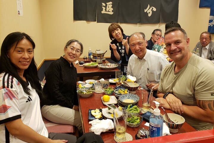Tsugaru shamisen performance over traditional dinner — photo 13